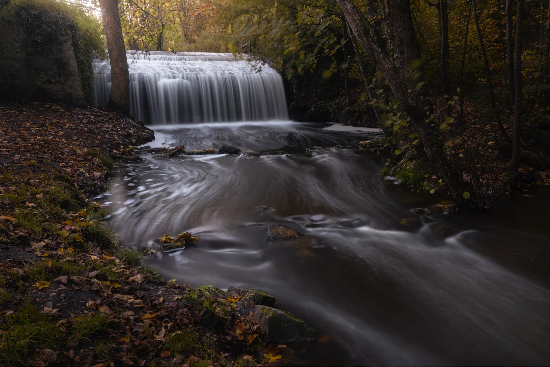 Waterfall of Vaux de Cernay with water swirls