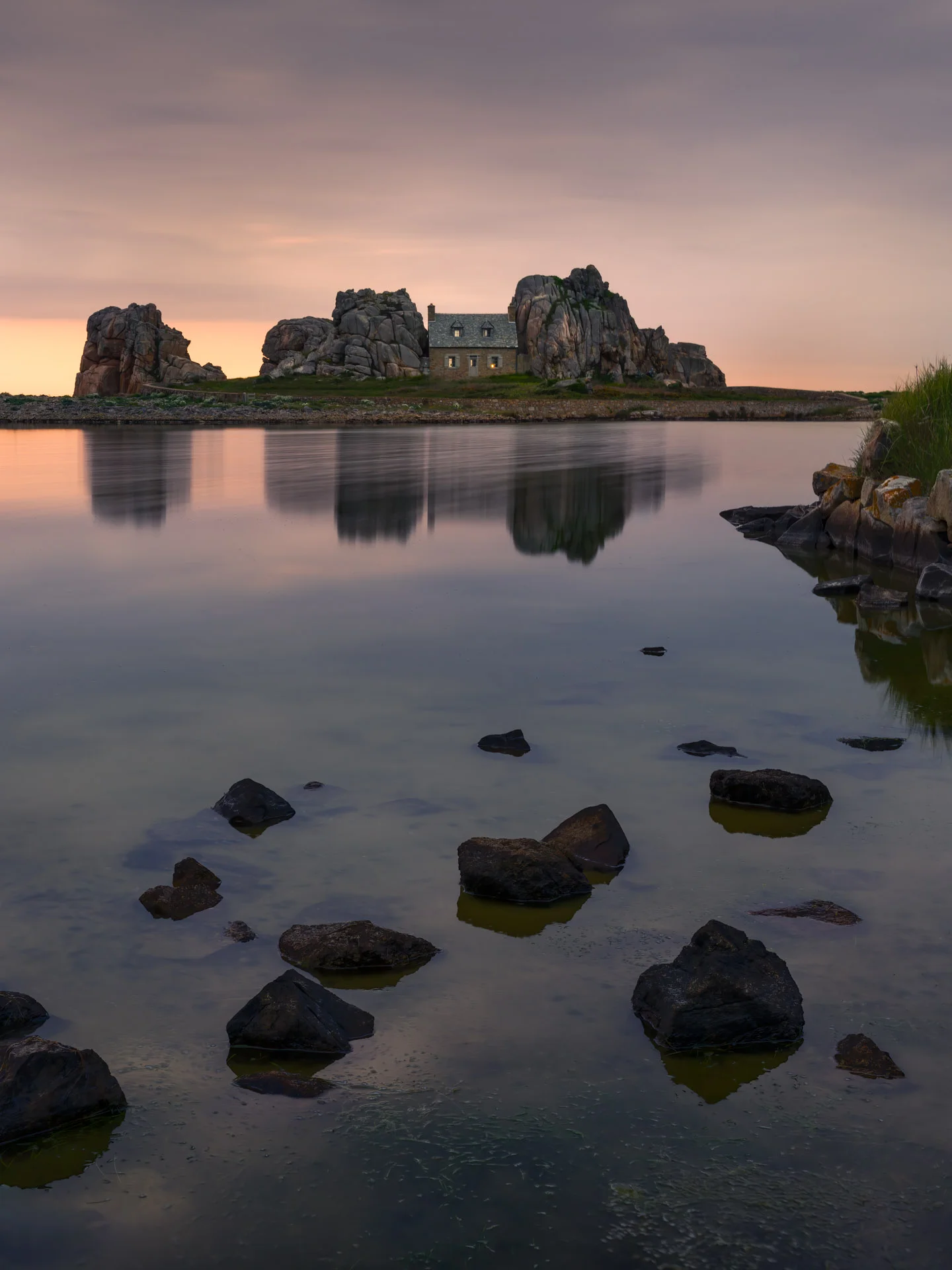 House near Plougrescant in Brittany at sunset