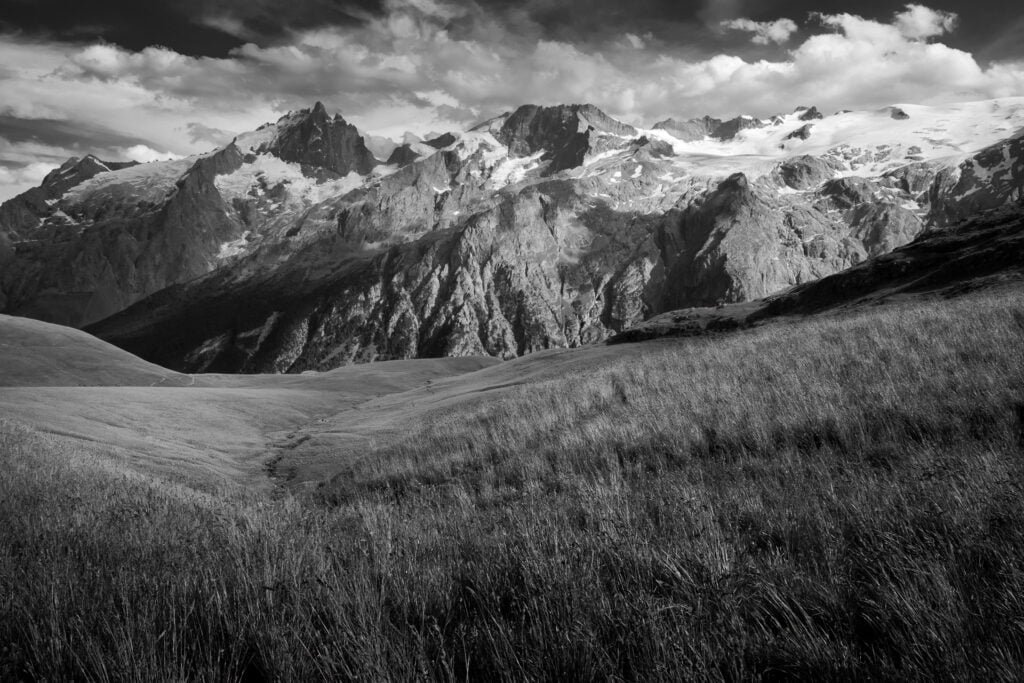 Fields and mountains in La Grave, alps
