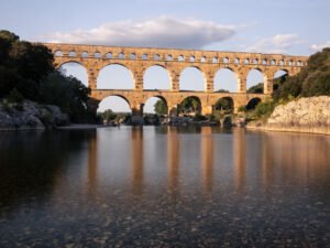 Pont du Gard with gravels reflects